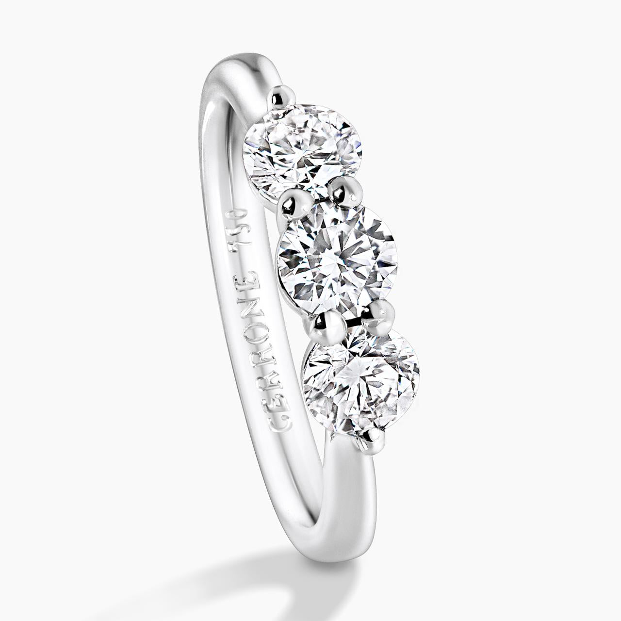 18ct white gold 3=1.01ct round brilliant cut diamonds ring in a claw setting side view