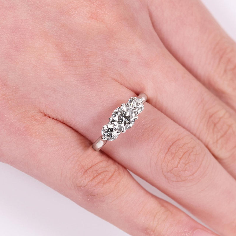 18ct white gold 3=1.01ct round brilliant cut diamonds ring in a claw setting on finger