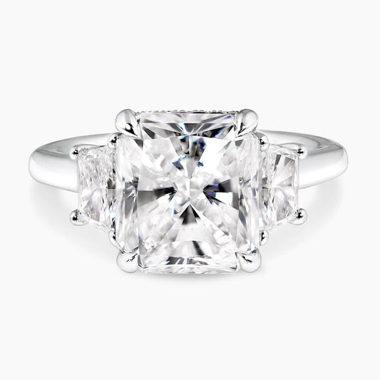 Platinum 5.03ct radiant diamond ring with 2=0.73ct trapezoid brilliant cut diamonds on the sides