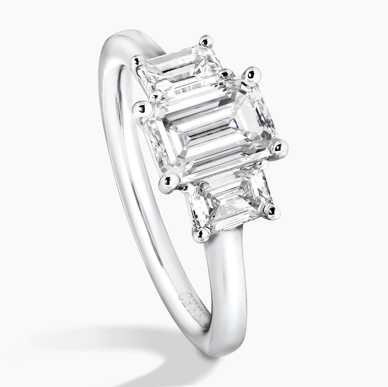 18ct white gold 1.20ct and 2=0.70ct emerald cut diamonds ring in a four claw setting GIA Cert side profile