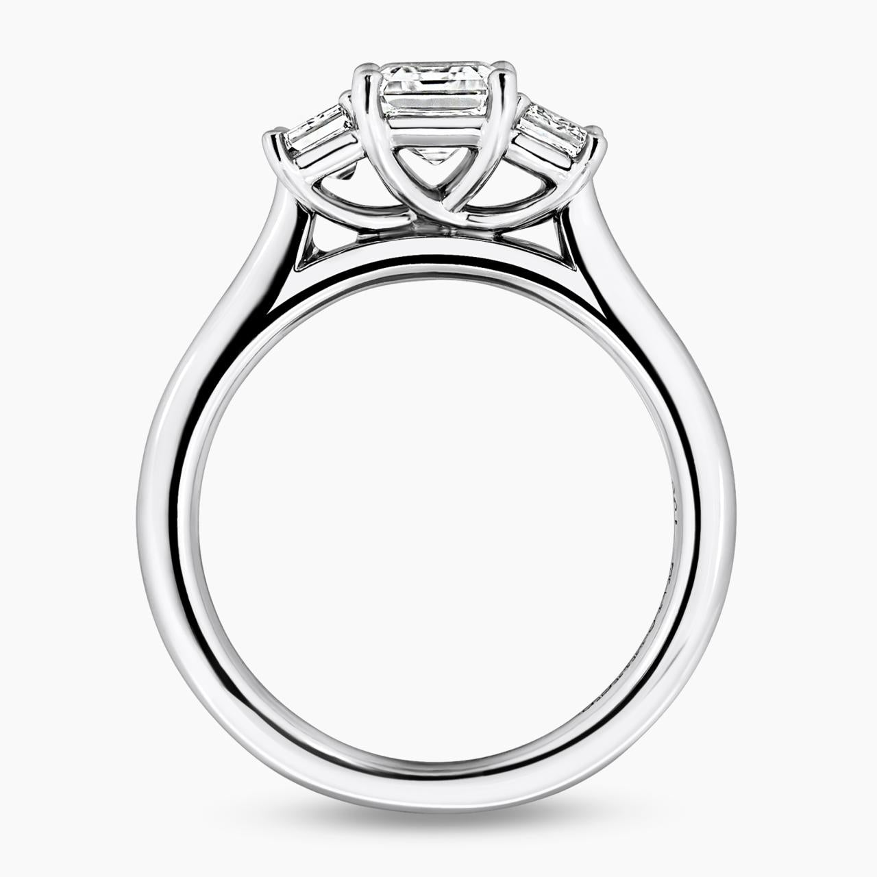 18ct white gold 1.20ct and 2=0.70ct emerald cut diamonds ring in a four claw setting GIA Cert side profile