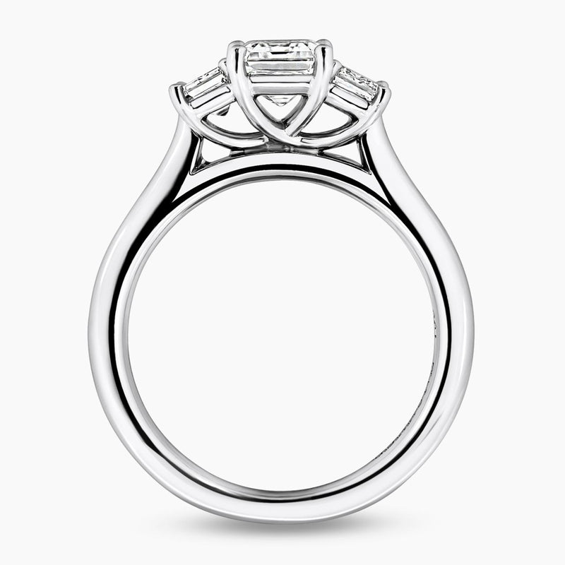 18ct white gold 1.20ct and 2=0.70ct emerald cut diamonds ring in a four claw setting GIA Cert side profile