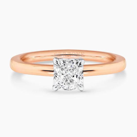 18ct rose gold 0.83ct cushion cut diamond solitaire ring in a four claw setting