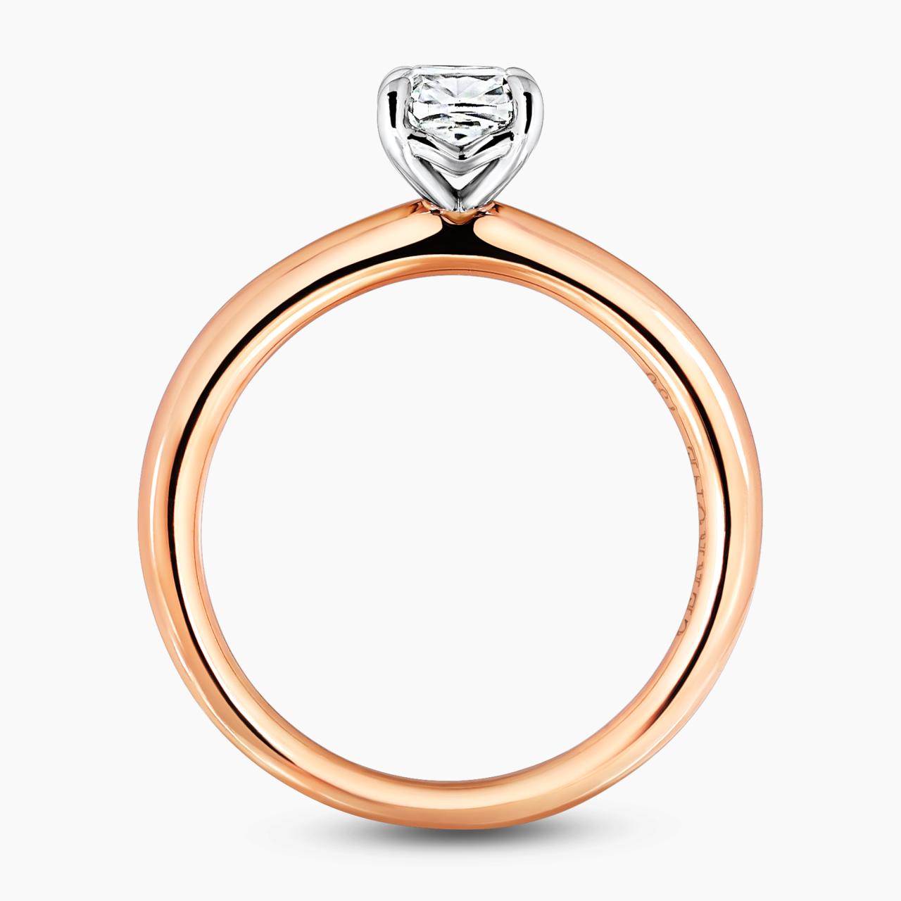 18ct rose gold 0.83ct cushion cut diamond solitaire ring in a four claw setting side profile