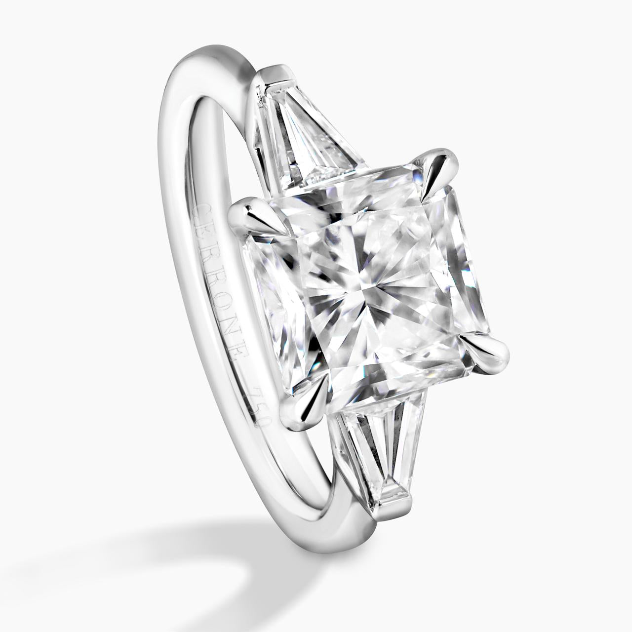 18ct white gold 3.01ct square radiant diamond and 2=0.38ct tapered baguette diamonds ring side view