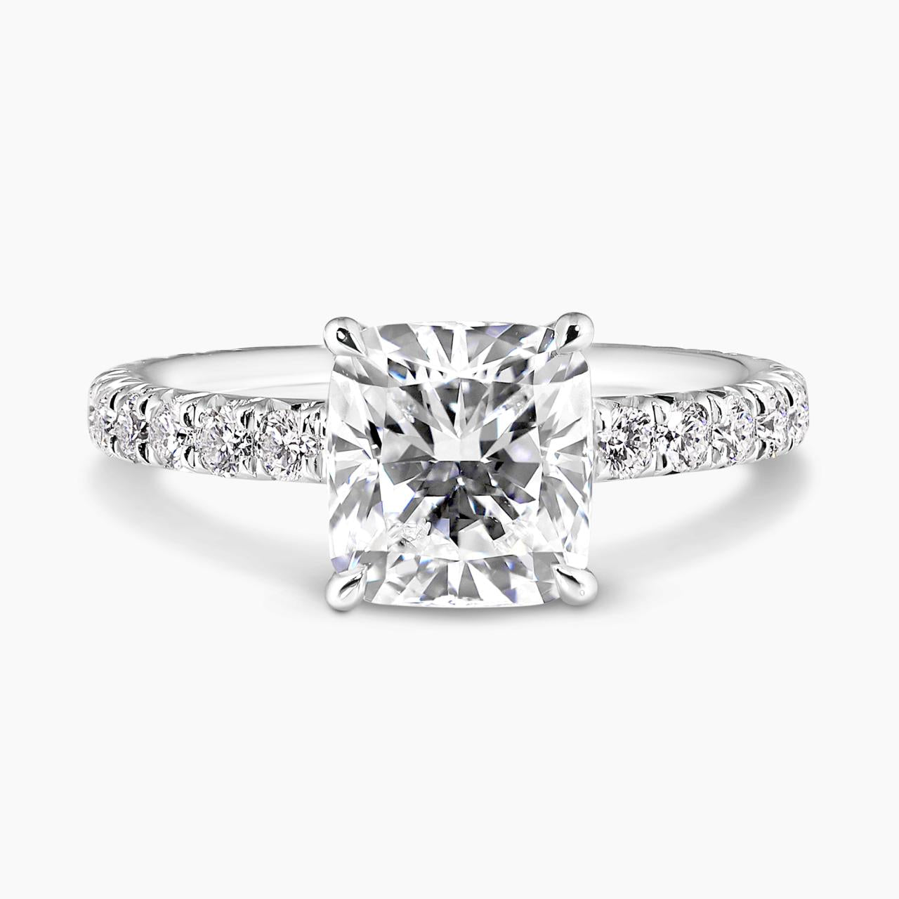 18ct white gold 2.02ct cushion cut diamond ring in a four claw setting with diamond band