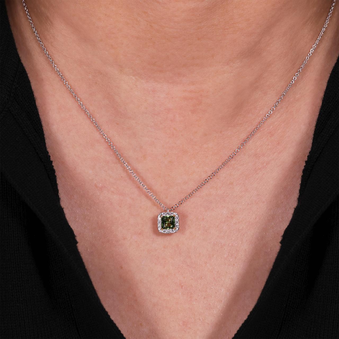 18ct white and yellow gold Asscher cut Tanzanian green tourmaline and diamond necklace on the neck