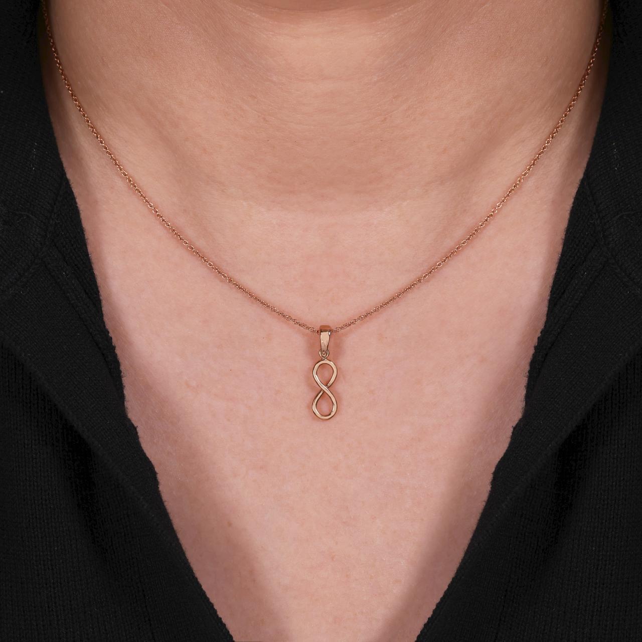 18ct rose gold "infinity" shape pendant on the neck