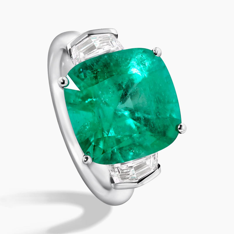 18ct white gold cushion cut Colombian Emerald and Cadillac diamond ring