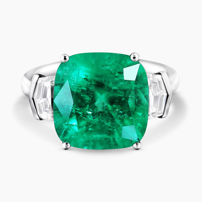 18ct white gold cushion cut Colombian Emerald and Cadillac diamond ring