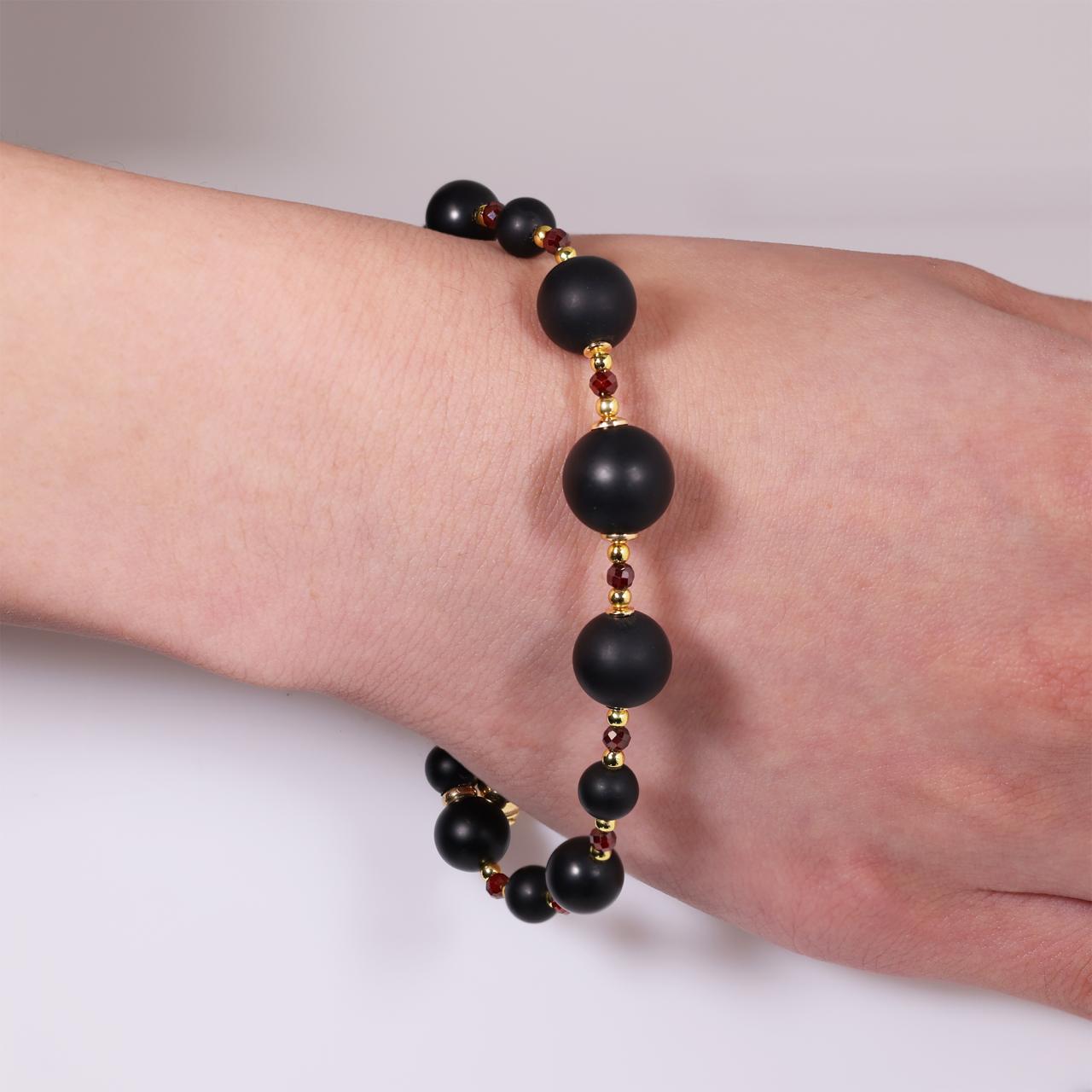 Onyx, garnet and hematite beads bracelet with gold plated silver fittings from the Carmela Cerrone Collection
