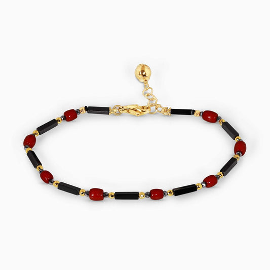 Hematite and coral beads bracelet with gold plated silver fittings 