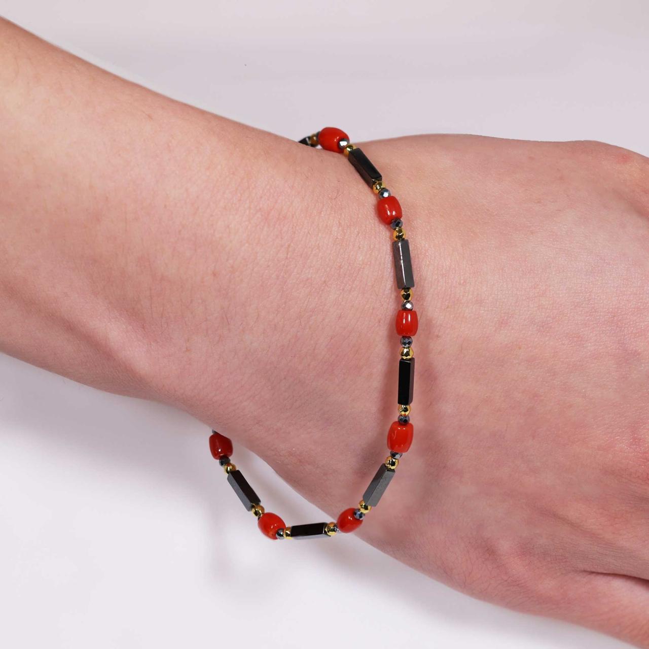 Hematite and coral beads bracelet with gold plated silver fittings from the Carmela Cerrone Collection