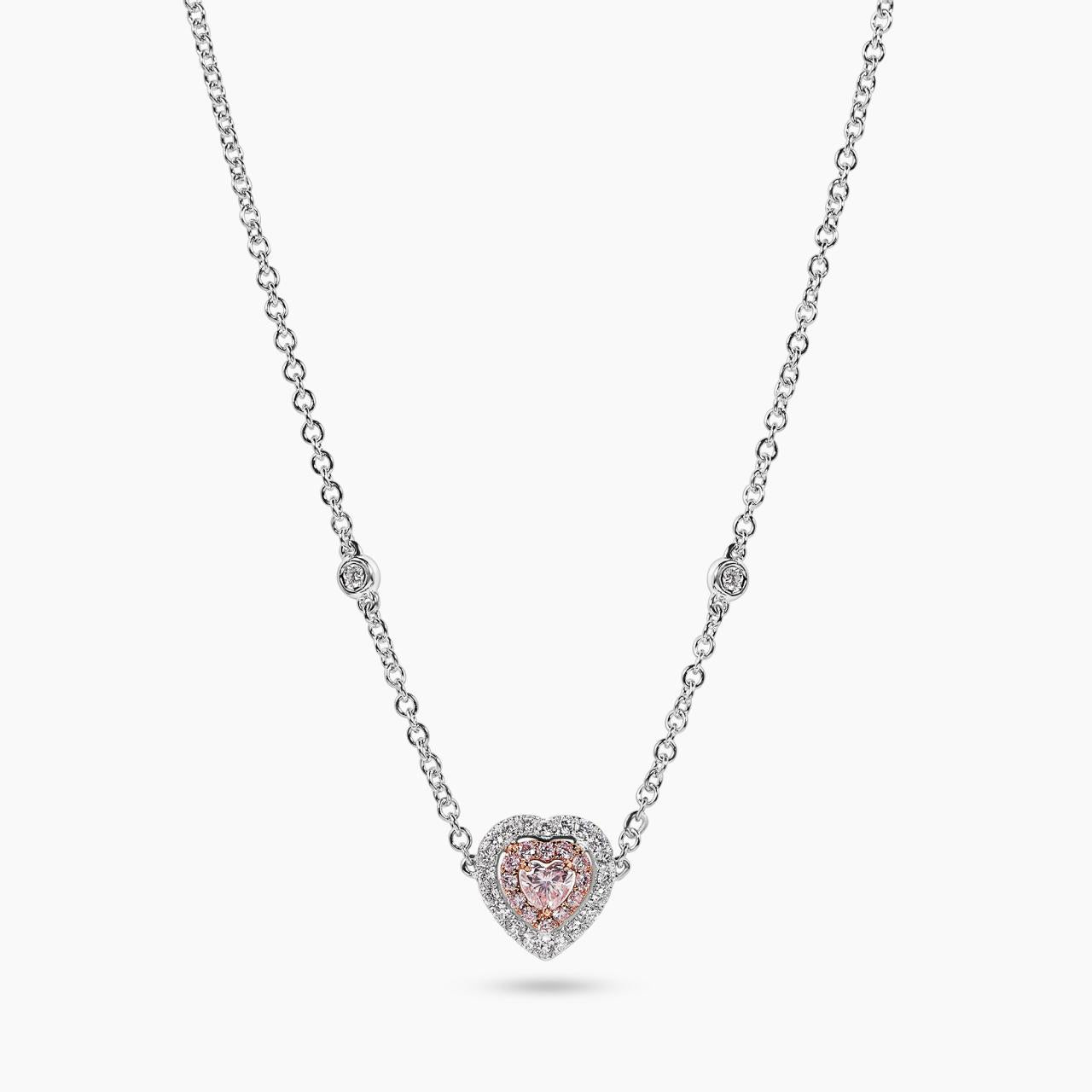 18ct white and rose gold pink and white diamond heart necklace on white background