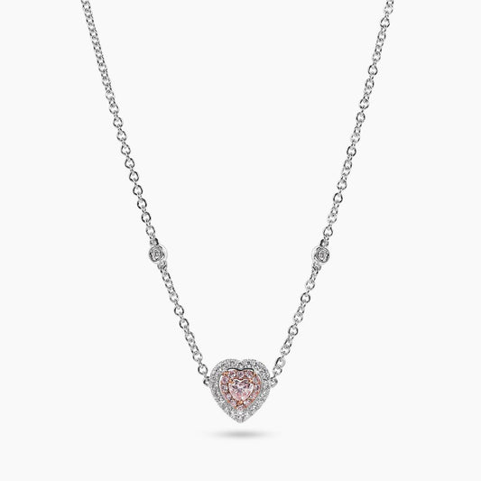 18ct white and rose gold pink and white diamond heart necklace on white background
