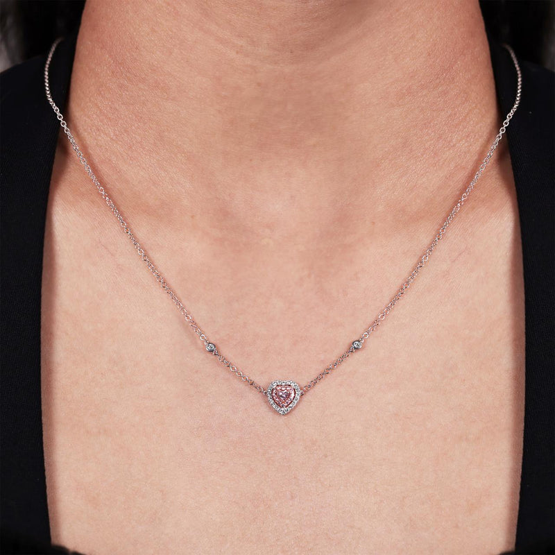 18ct white and rose gold pink and white diamond heart necklace on the neck