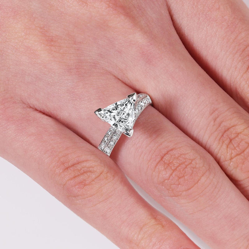 18ct White gold trilliant diamond engagement ring in a three claw setting on the finger