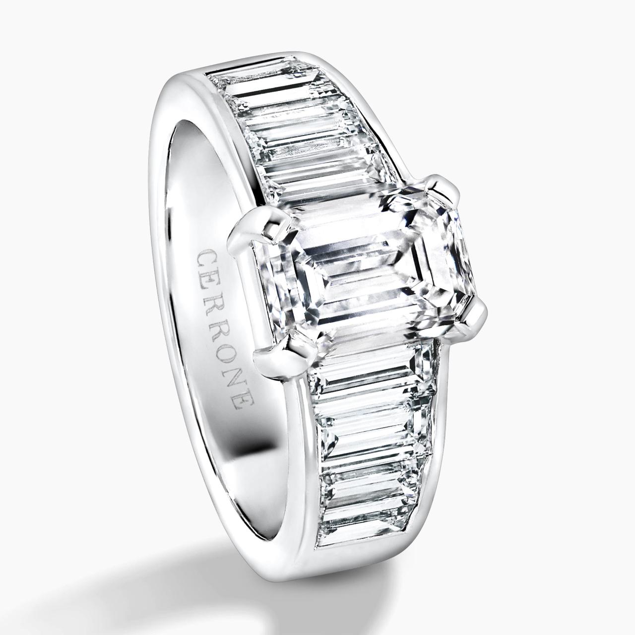 18ct White gold emerald cut diamond engagement ring with baguette cut diamonds on the band