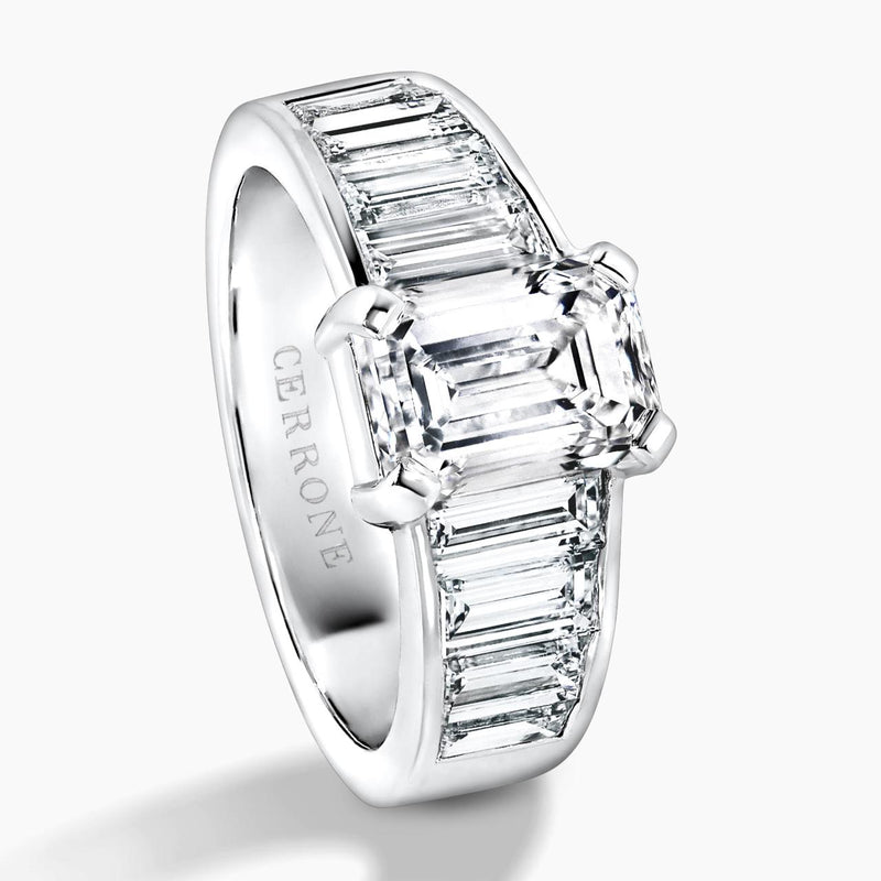 18ct White gold emerald cut diamond engagement ring with baguette cut diamonds on the band