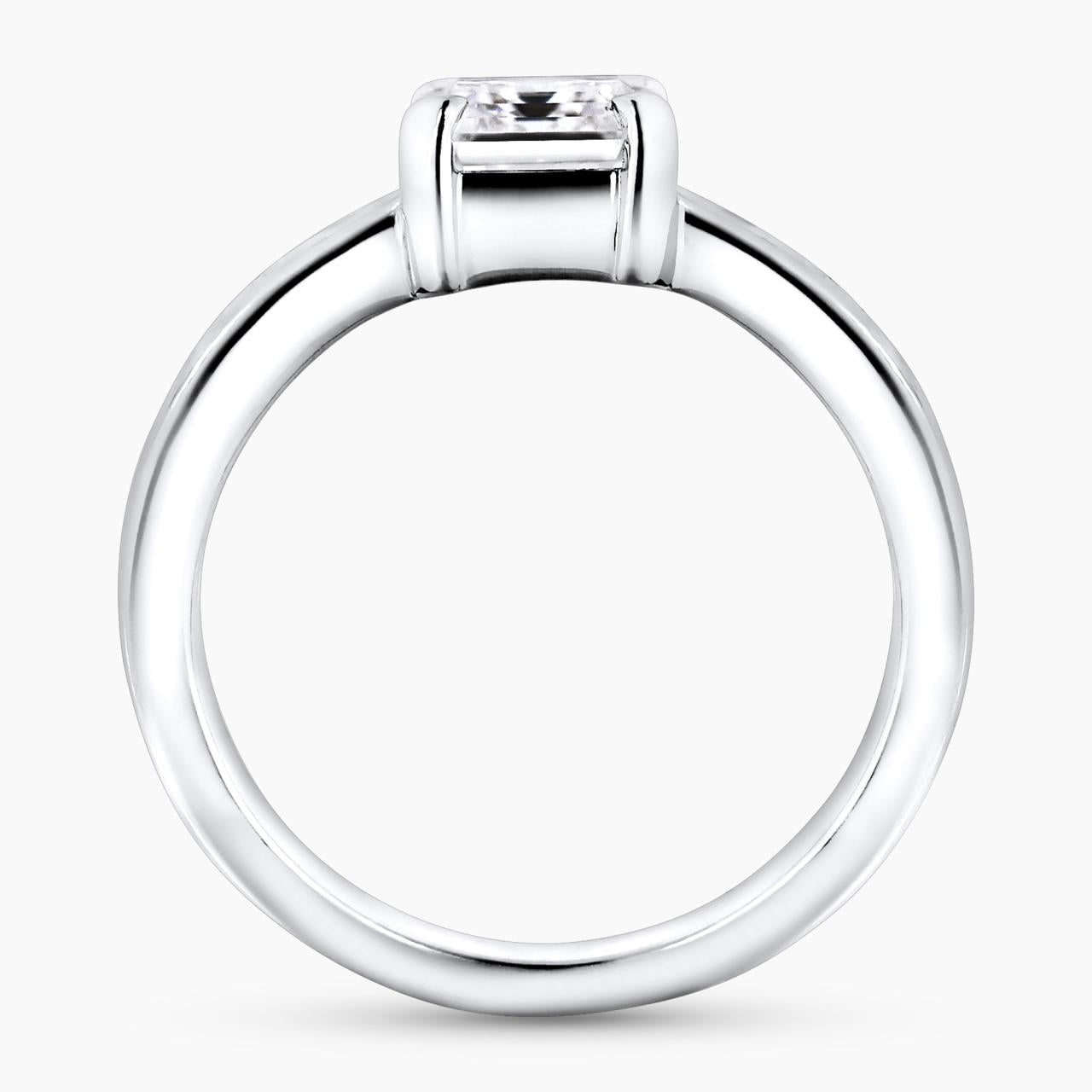 18ct White gold emerald cut diamond engagement ring with baguette cut diamonds on the band side profile