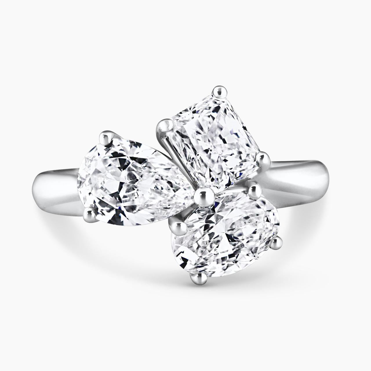 18ct white gold oval, pear and radiant diamond engagement ring