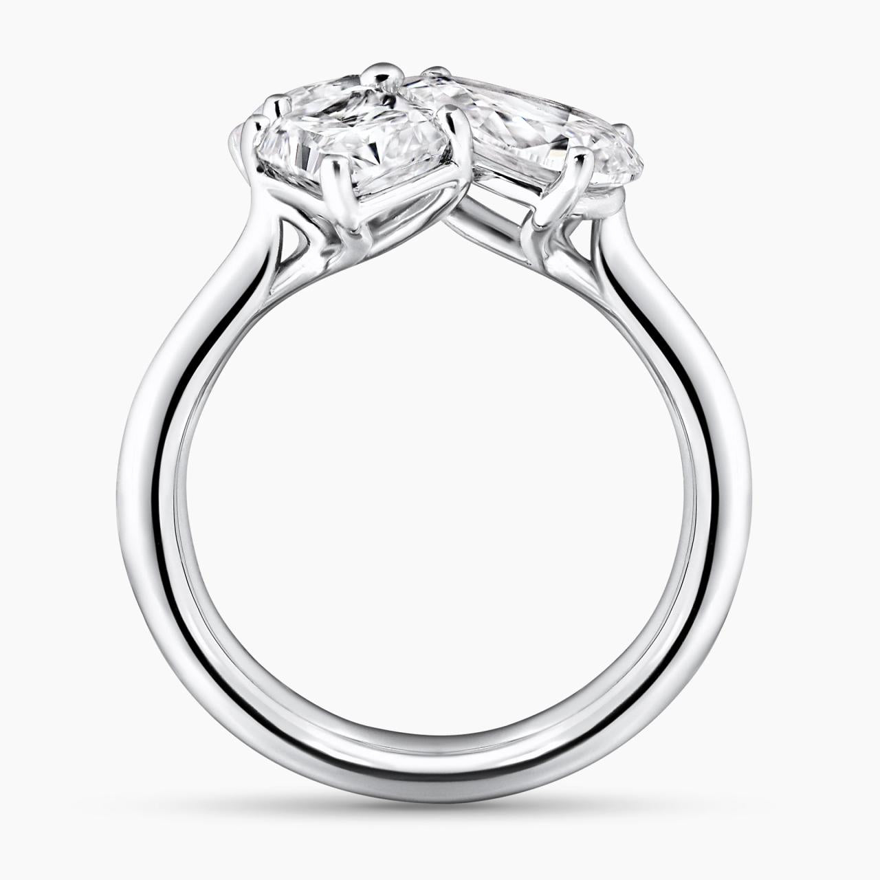 18ct white gold oval, pear and radiant diamond engagement ring side profile