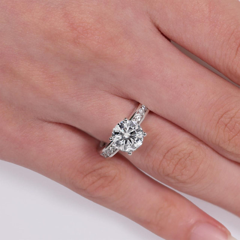 18ct white gold round brilliant cut LAB Grown diamond engagement ring on the finger