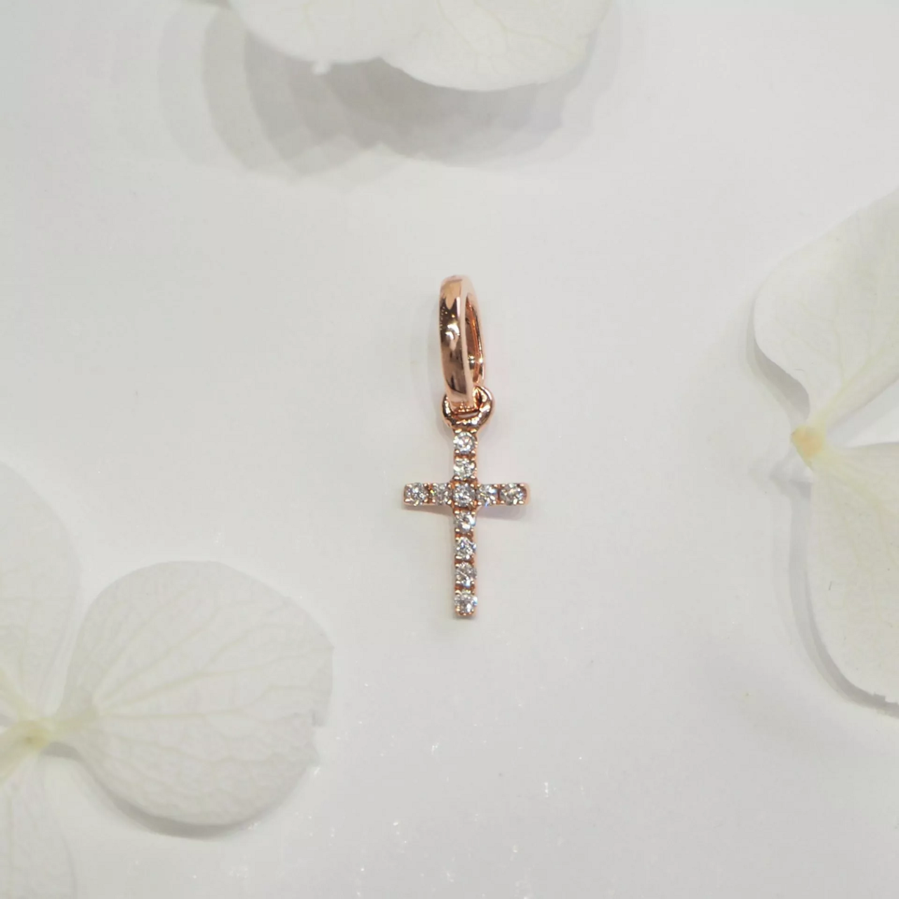18ct rose gold diamond set small cross pendant