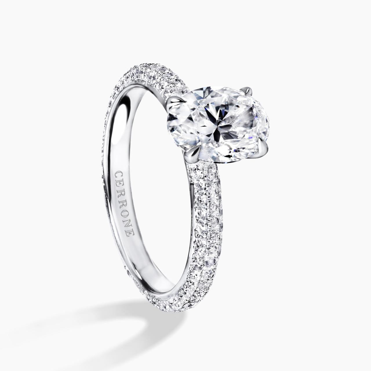 18ct white gold 1.51ct F SI1 oval and round brilliant cut pave set diamond ring