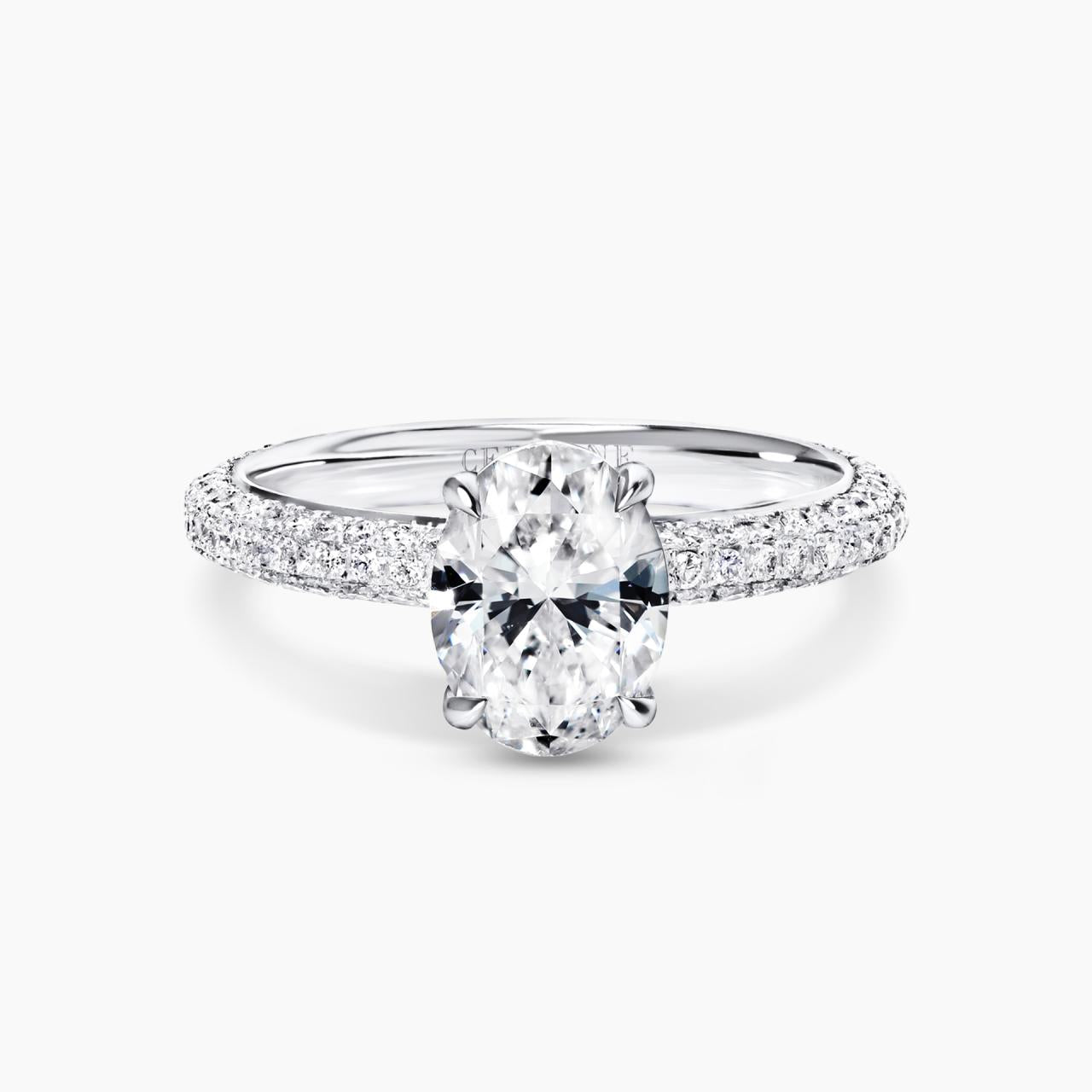 18ct white gold 1.51ct F SI1 oval and round brilliant cut pave set diamond ring