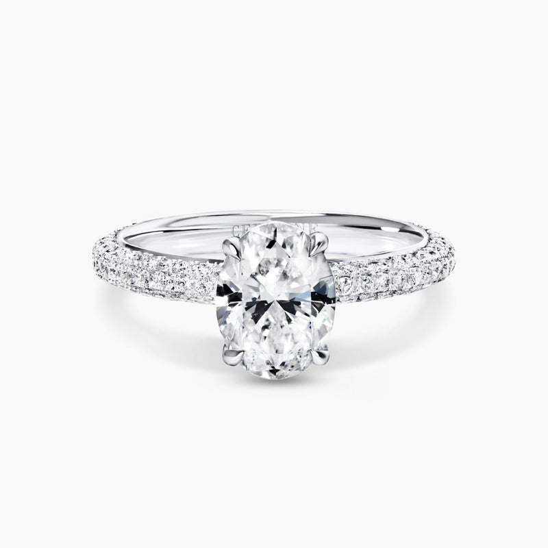 18ct white gold 1.51ct F SI1 oval and round brilliant cut pave set diamond ring