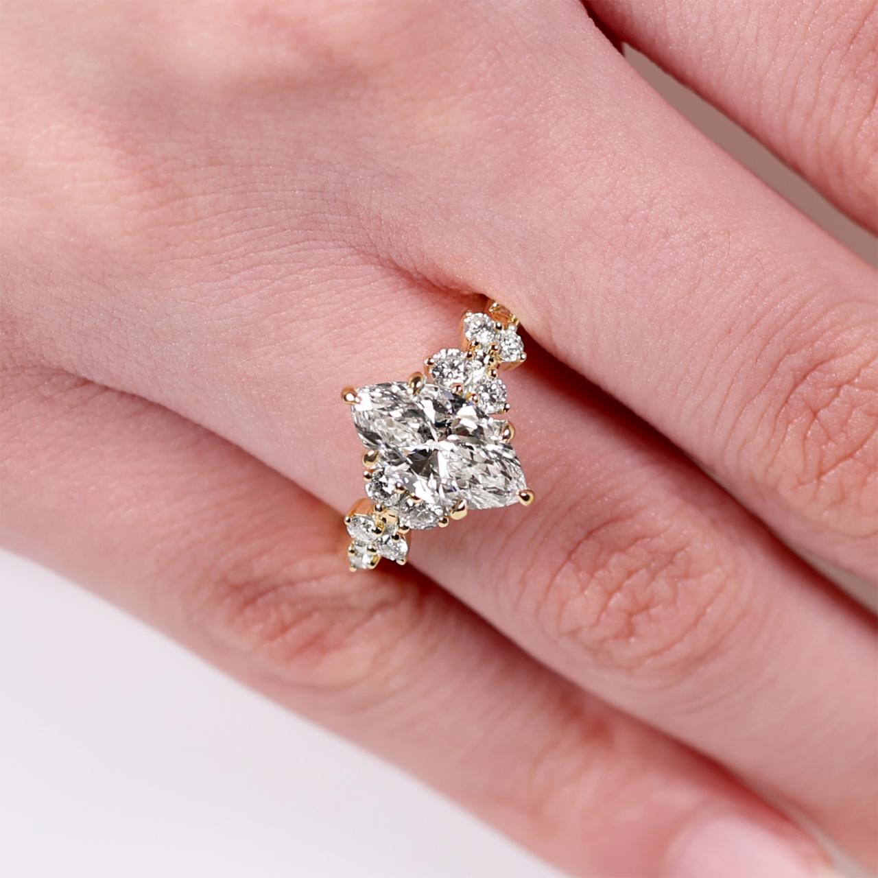 18ct yellow gold 2.02ct D VVS2 marquise lab grown diamond ring IGI Cert
