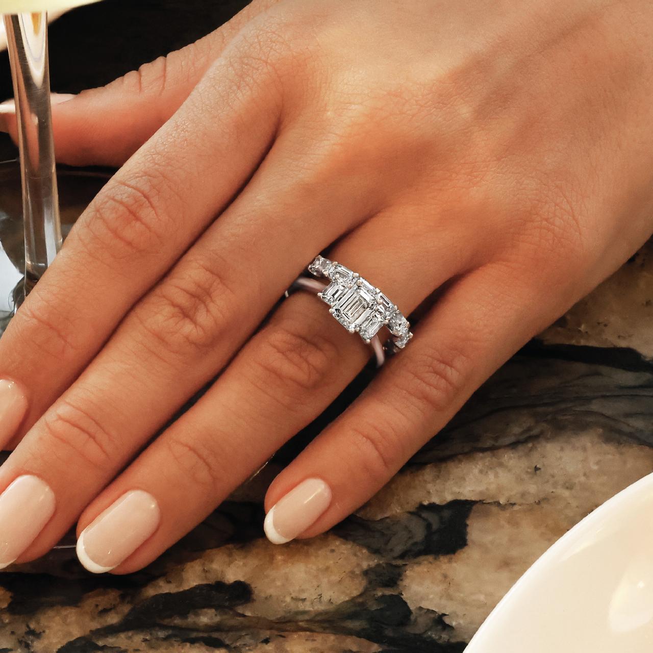 Platinum emerald cut diamond ring