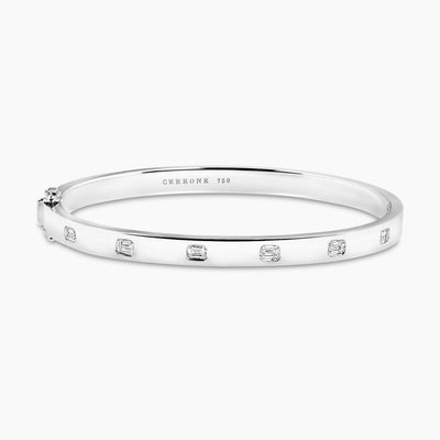 18ct white gold baguette diamonds bangle on white background
