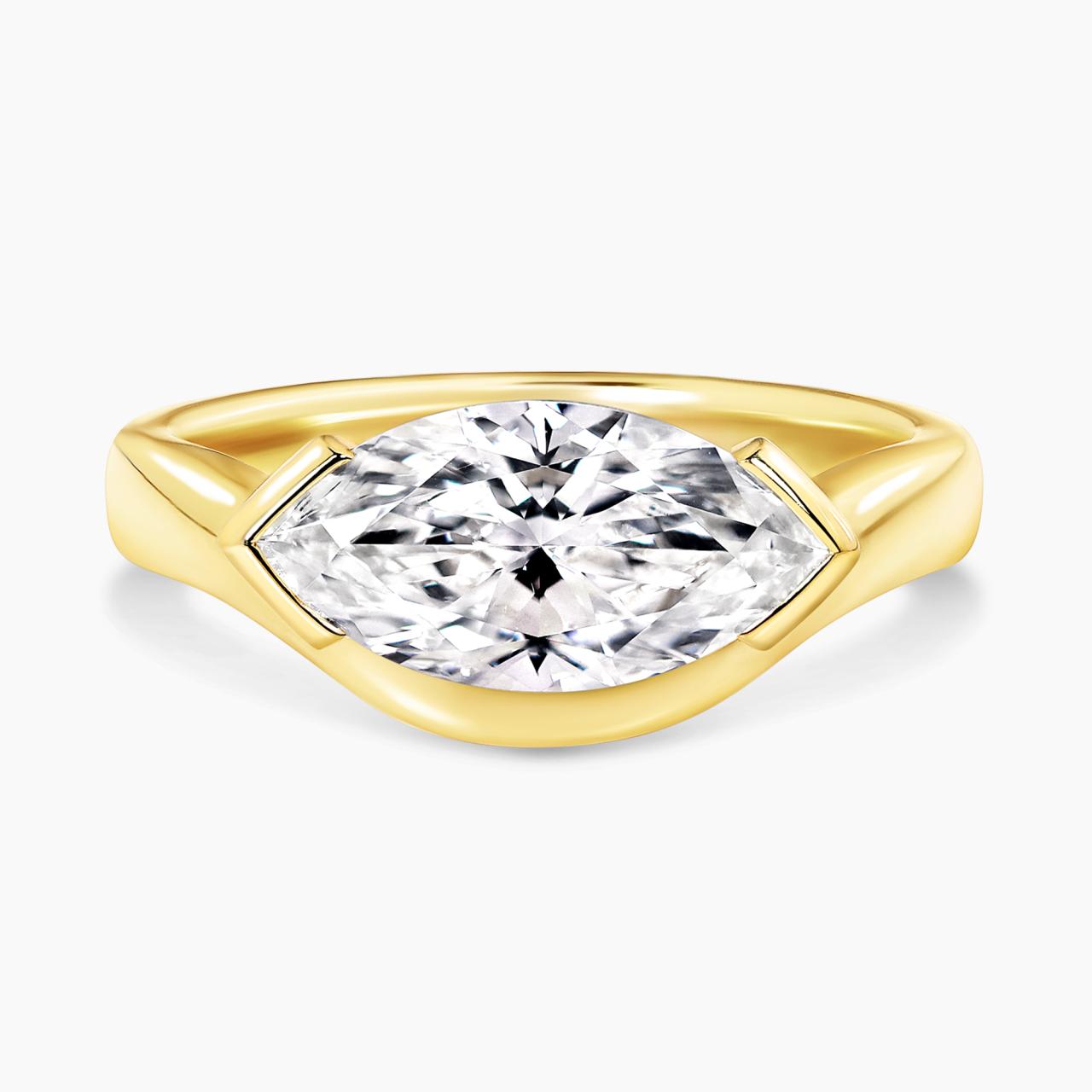 18ct yellow gold 2.07ct D VVS2 marquise lab grown diamond ring in a four claw setting. IGI Cert