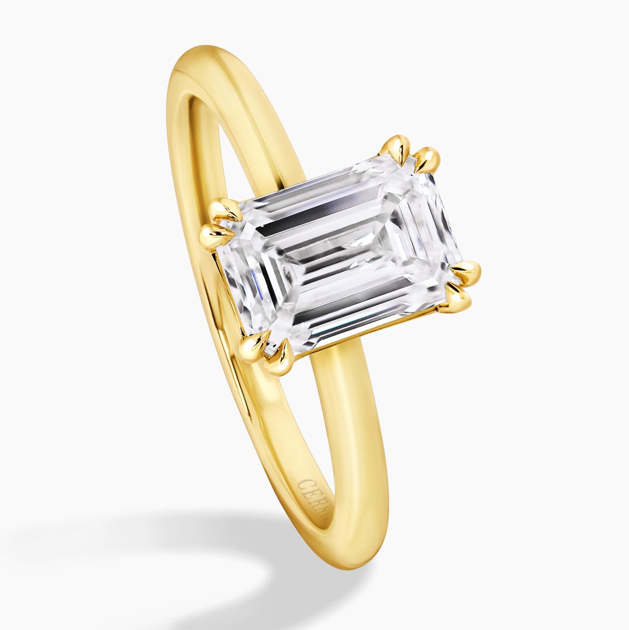 18ct yellow gold 2.00ct E VVS2 emerald cut lab grown diamond solitaire ring in a four claw setting. IGI Cert