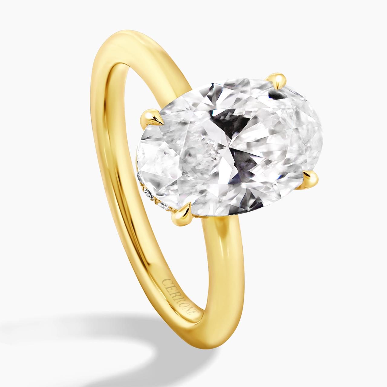 MILAN 18ct yellow gold 2.96ct D VVS2 oval lab grown diamond ring in a four claw setting with hidden halo. IGI Cert