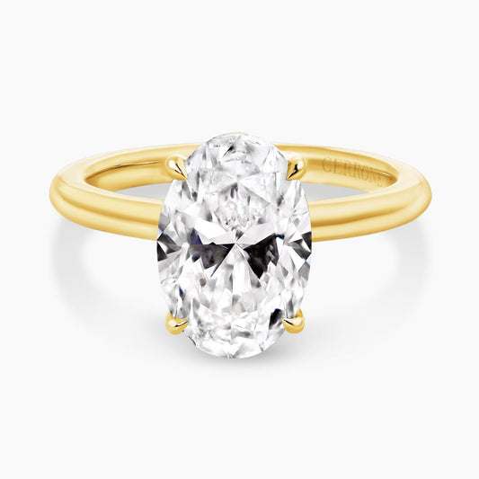MILAN 18ct yellow gold oval lab grown diamond ring in a four claw setting with hidden halo