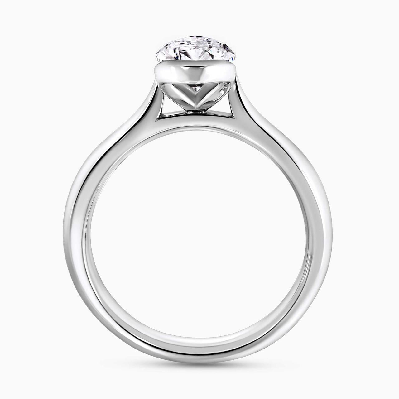 Platinum gold 1.40ct D VVS2 pear shaped lab grown diamond solitaire engagement ring in a half bezel setting. IGI Cert