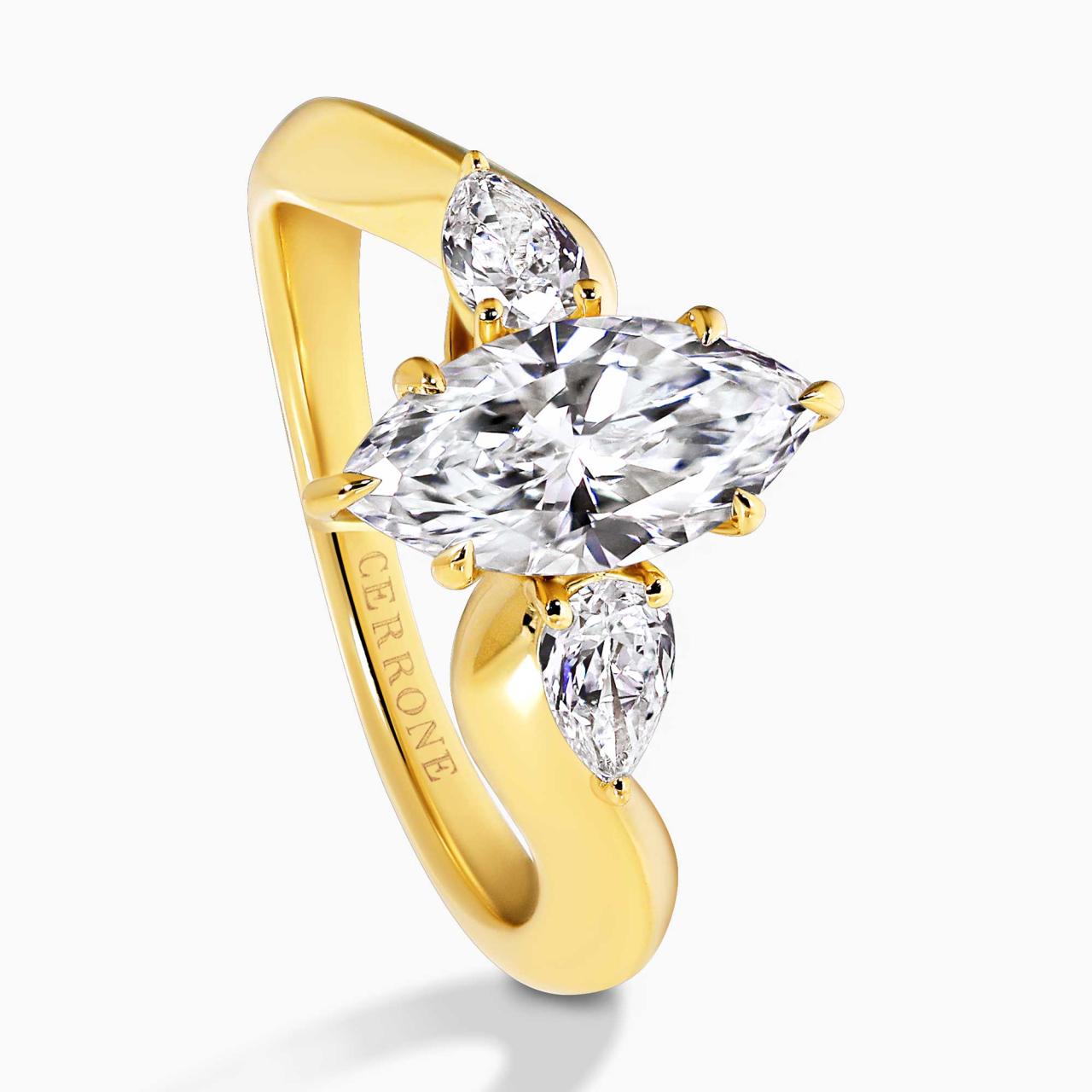 18ct yellow gold 1.27ct D VVS2 marquise lab grown diamond engagement ring with pear shaped lab diamonds on the side IGI Cert