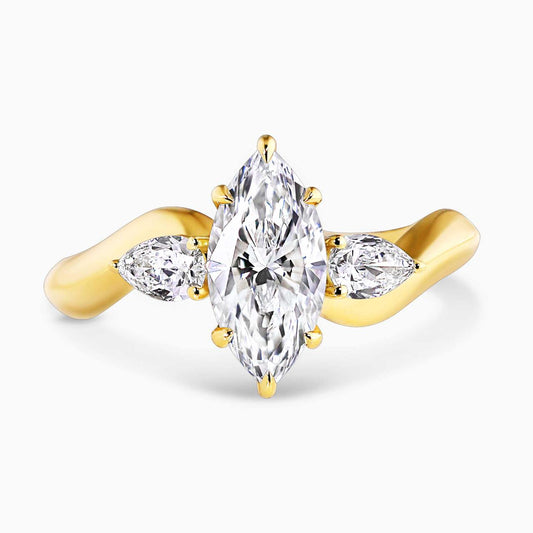 18ct yellow gold marquise lab grown diamond engagement ring with pear shaped lab diamonds on the side 