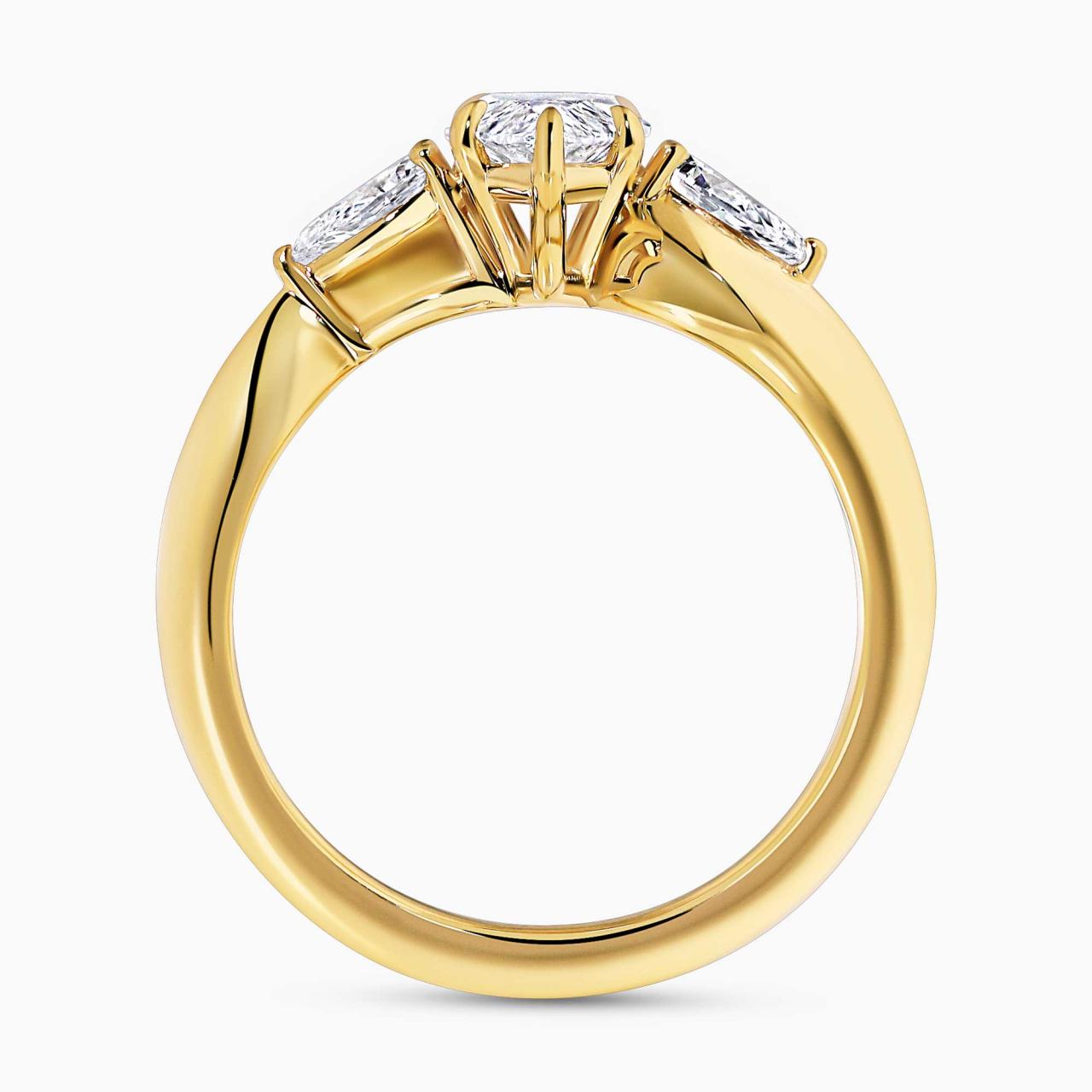 18ct yellow gold 1.27ct D VVS2 marquise lab grown diamond engagement ring with pear shaped lab diamonds on the side IGI Cert