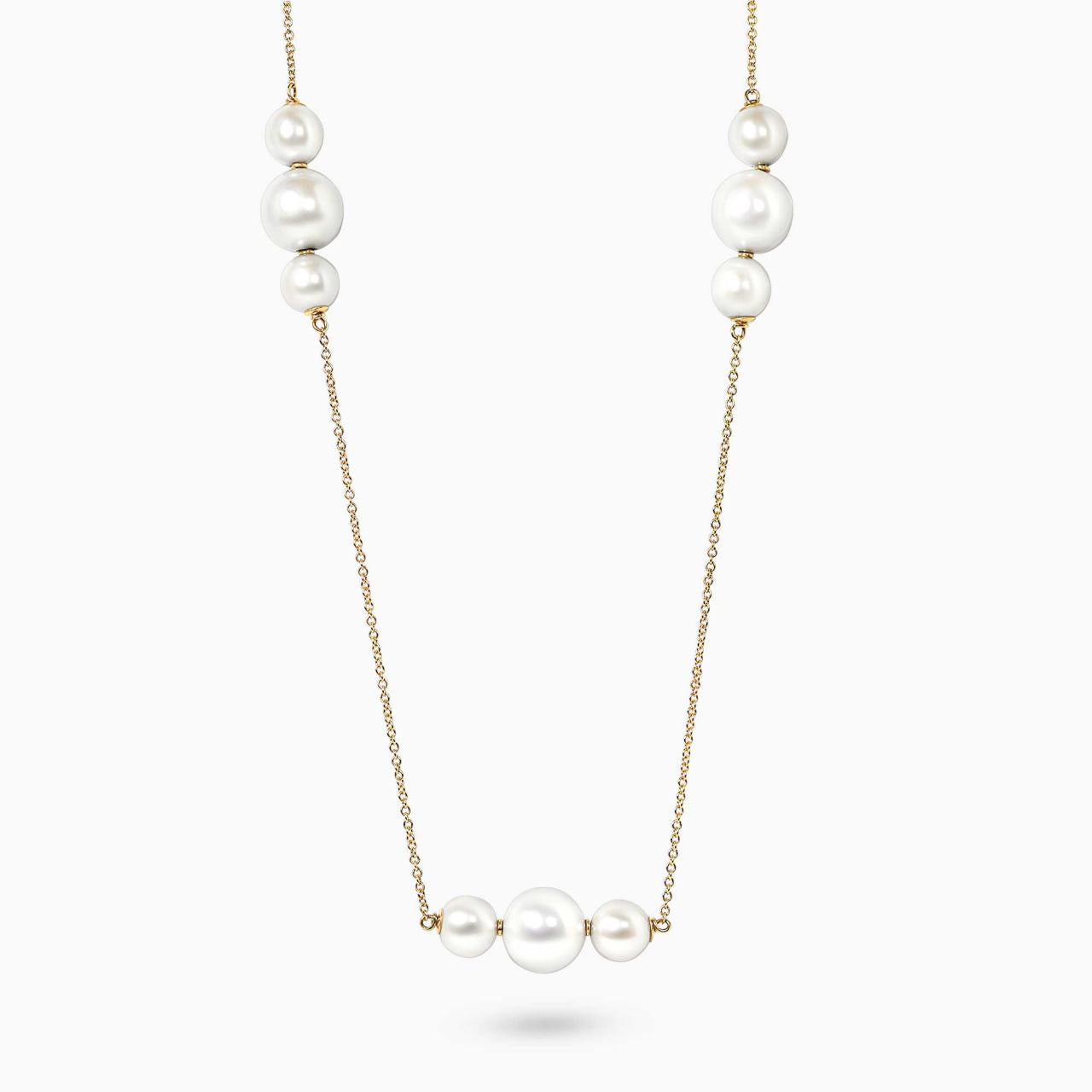 18ct yellow gold fresh water pearls necklace on a white background
