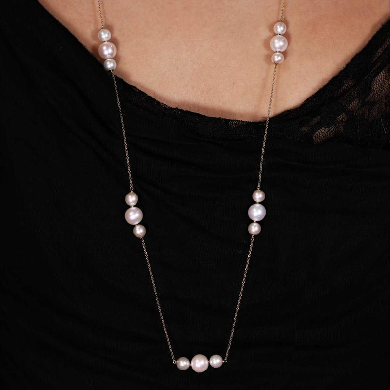 18ct yellow gold fresh water pearls drop necklace on the neck