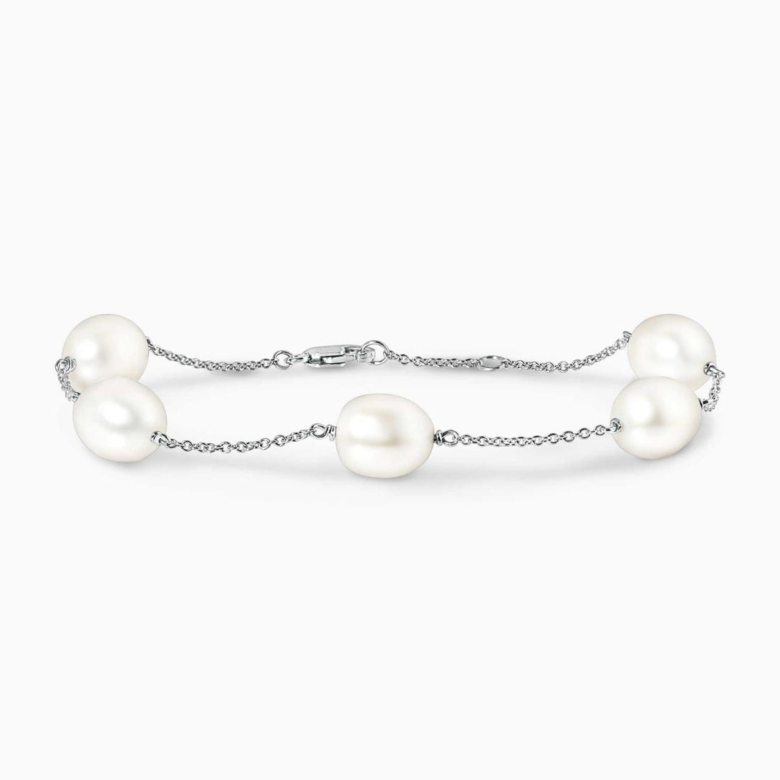18ct white gold fresh water rice shape pearls bracelet on a white background