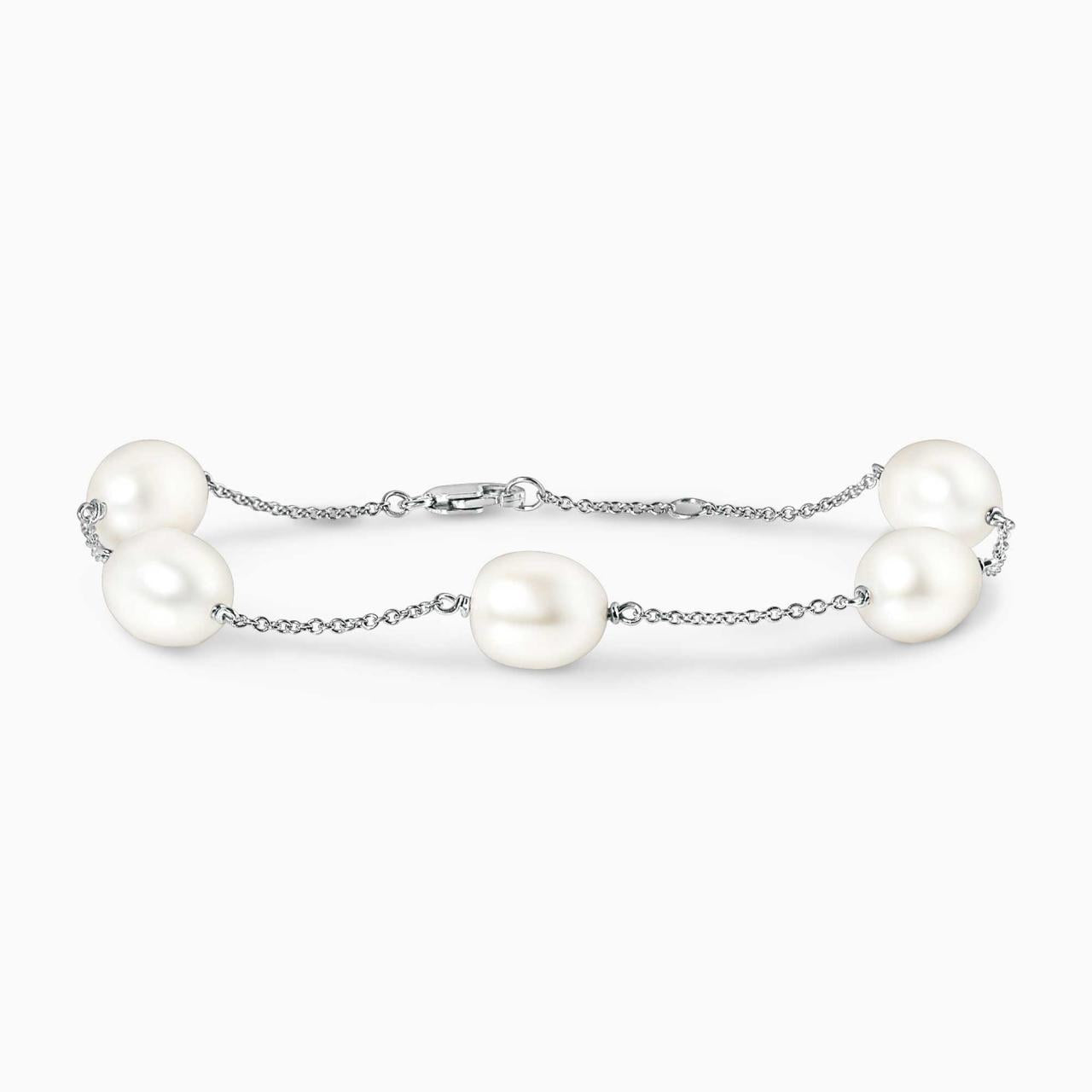 18ct white gold fresh water rice shape pearls bracelet on a white background