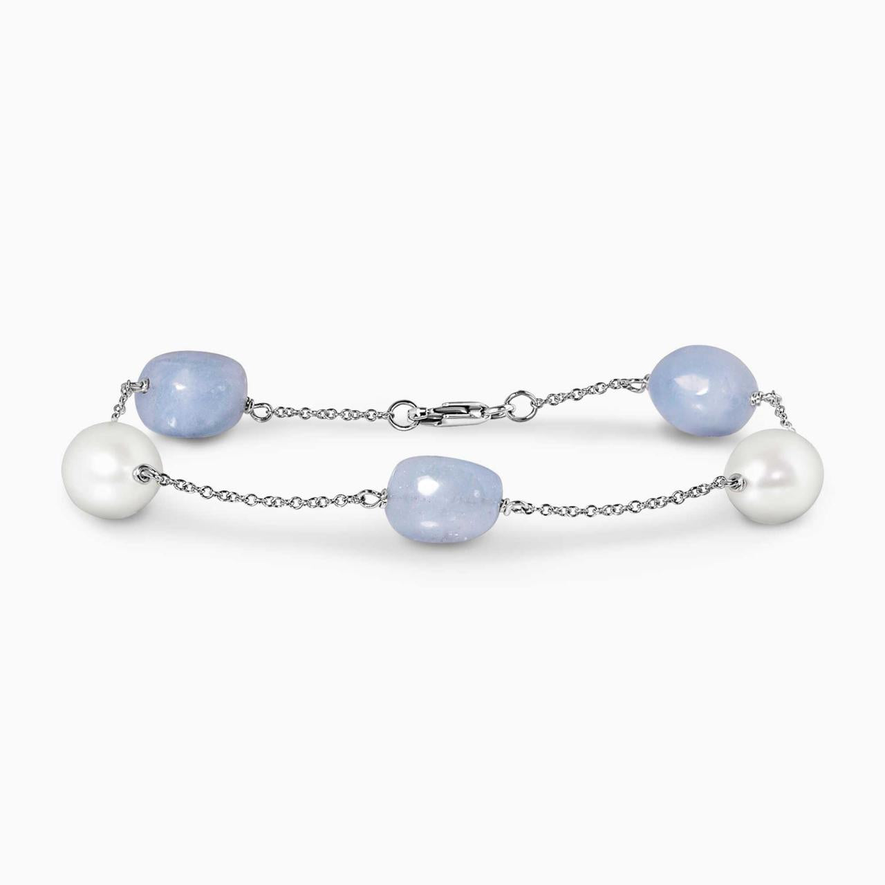 18ct white gold freshwater rice shape pearls and Brazilian aquamarine beads bracelet on a white background