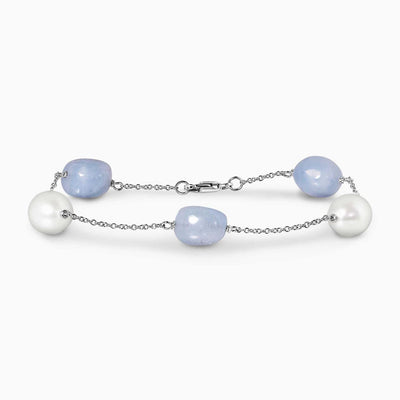 18ct white gold freshwater rice shape pearls and Brazilian aquamarine beads bracelet on a white background