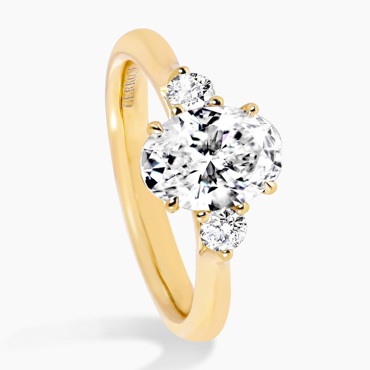 18ct yellow gold 1.60ct and 2=0.10ct oval lab grown diamonds three stone ring