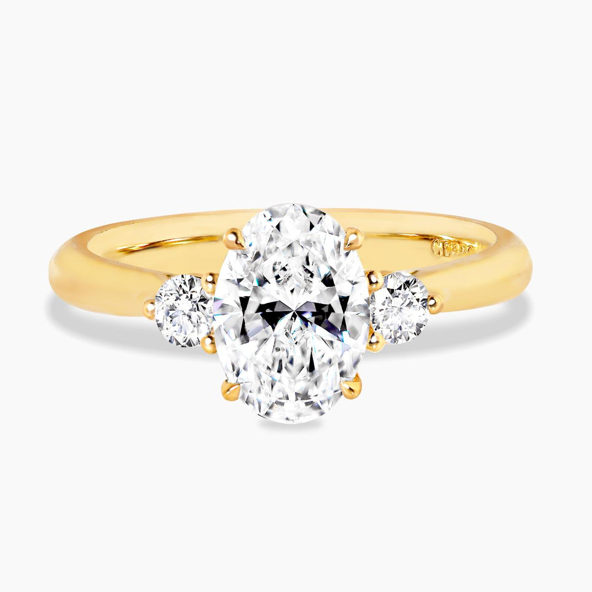 18ct yellow gold 1.60ct and 2=0.10ct oval lab grown diamonds three stone ring